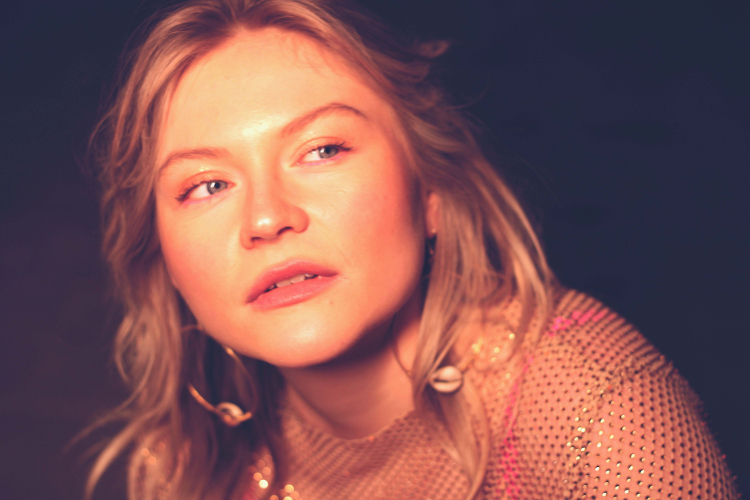 Saxophonist Tallulah's facial portrait