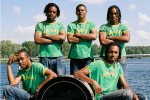 brazilian percussion band pose with their drums